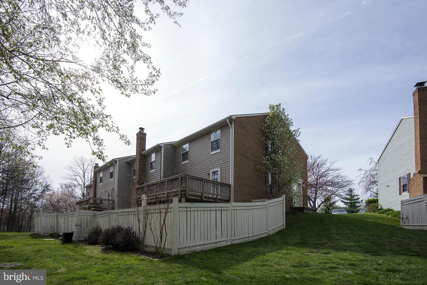 1511 Autumn Ridge Circle Reston, VA 20194 - Photo 27 of 29 a front view of a house with garden