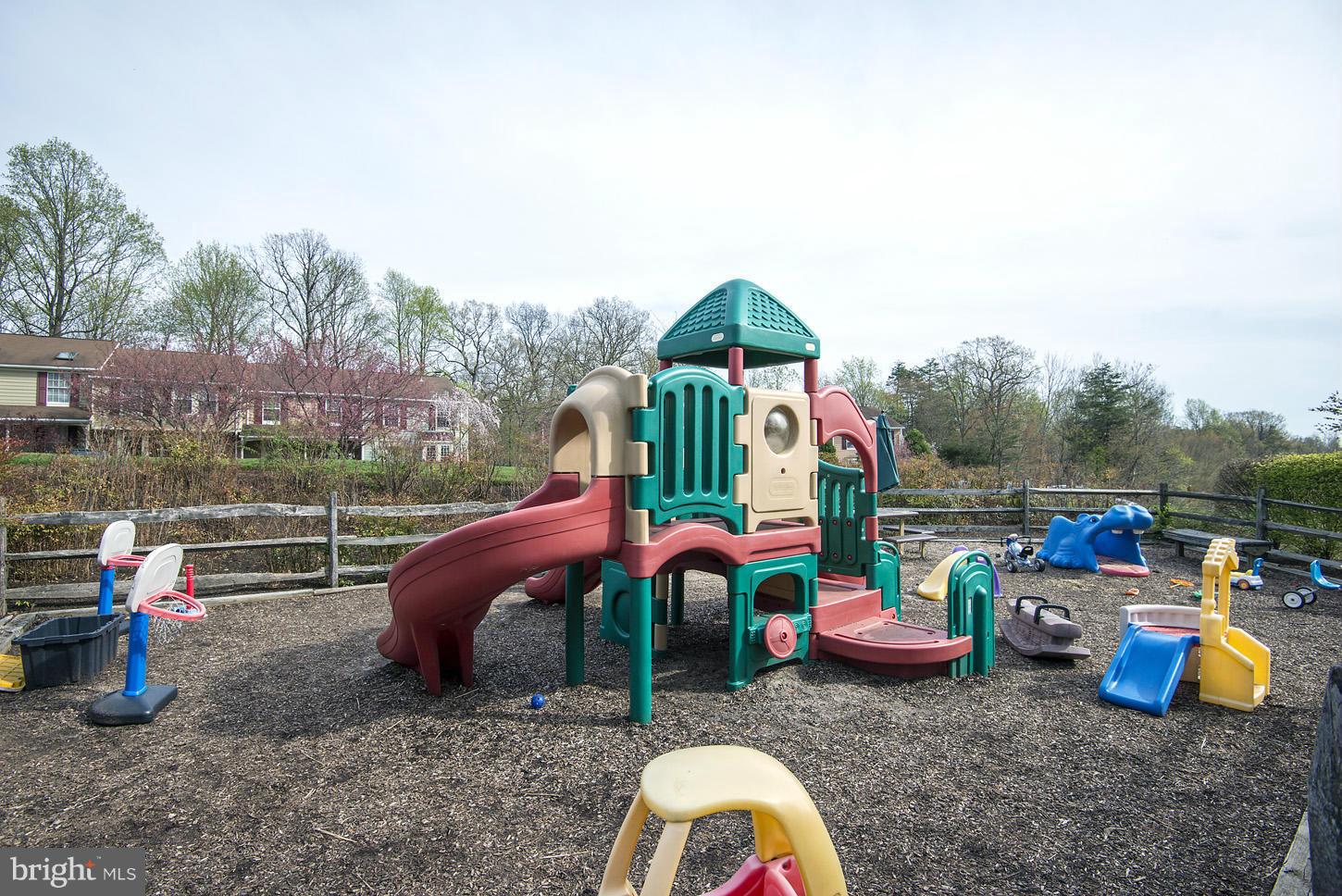 1511 Autumn Ridge Circle Reston, VA 20194 - Photo 28 of 29 a childrens park with lots of swings and slides