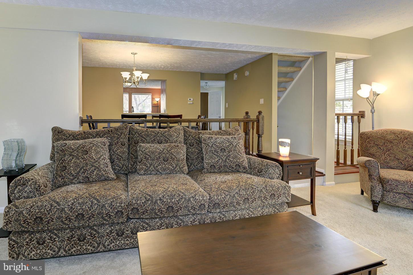 1511 Autumn Ridge Circle Reston, VA 20194 - Photo 10 of 29 a living room with furniture and a fireplace