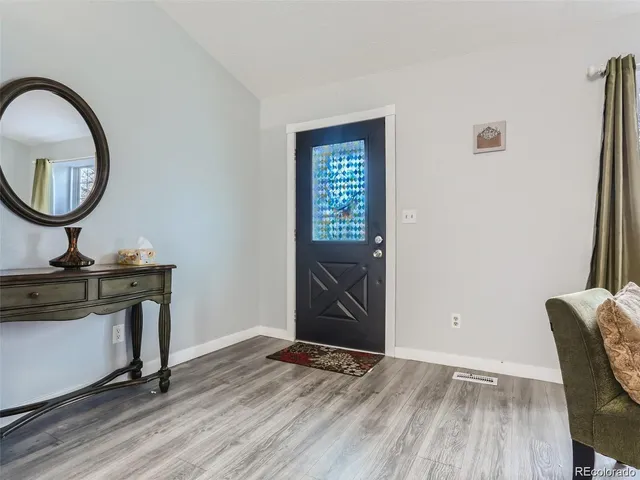 a bathroom with a sink a mirror and a toilet