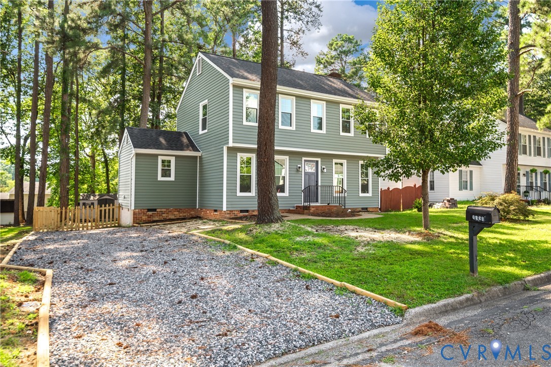 8928 Hawkbill Road North Chesterfield, VA 23237 - Photo 48 of 50 Two-story residence with gray siding, white trim,