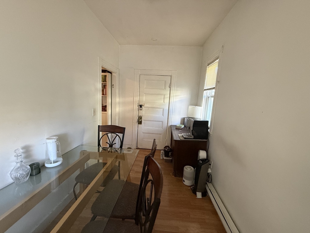 107 Bloomfield Street, Unit 3 Boston, MA 02124 - Photo 14 of 14 a view of a room with lounge chair