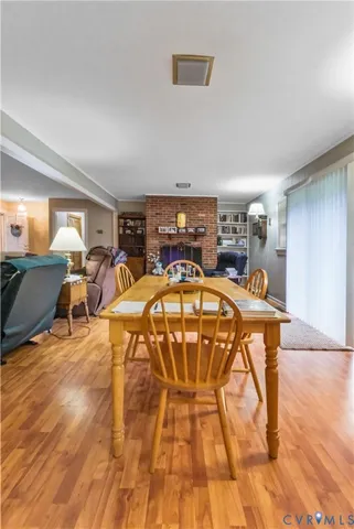 a view of a swimming pool with furniture