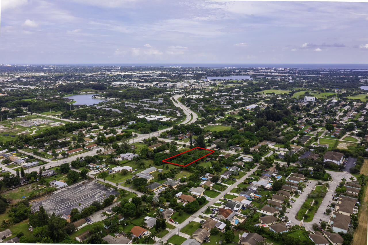 4843 Davis Road Lake Worth, FL 33461 - Photo 12 of 18 an aerial view of multiple house