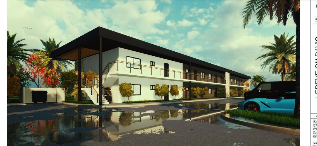 4843 Davis Road Lake Worth, FL 33461 - Photo 2 of 18 a front view of a house with parking