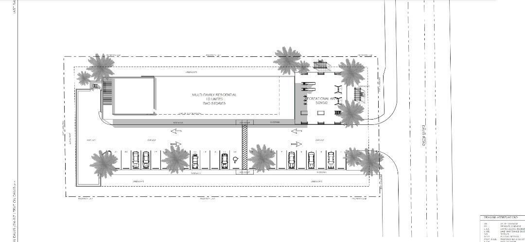 4843 Davis Road Lake Worth, FL 33461 - Photo 4 of 18 a picture of a bathroom with a window and a refrigerator