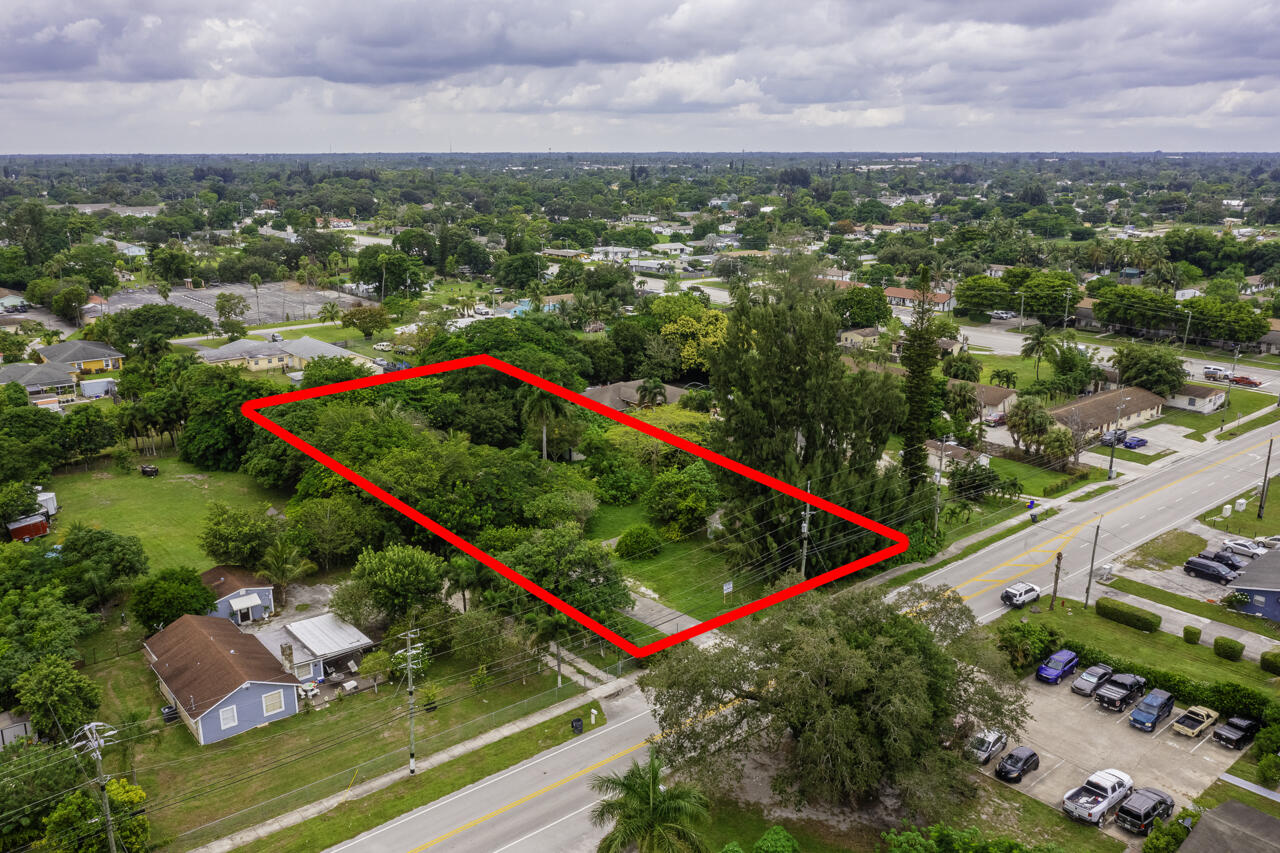 4843 Davis Road Lake Worth, FL 33461 - Photo 8 of 18 a view of a lush green field