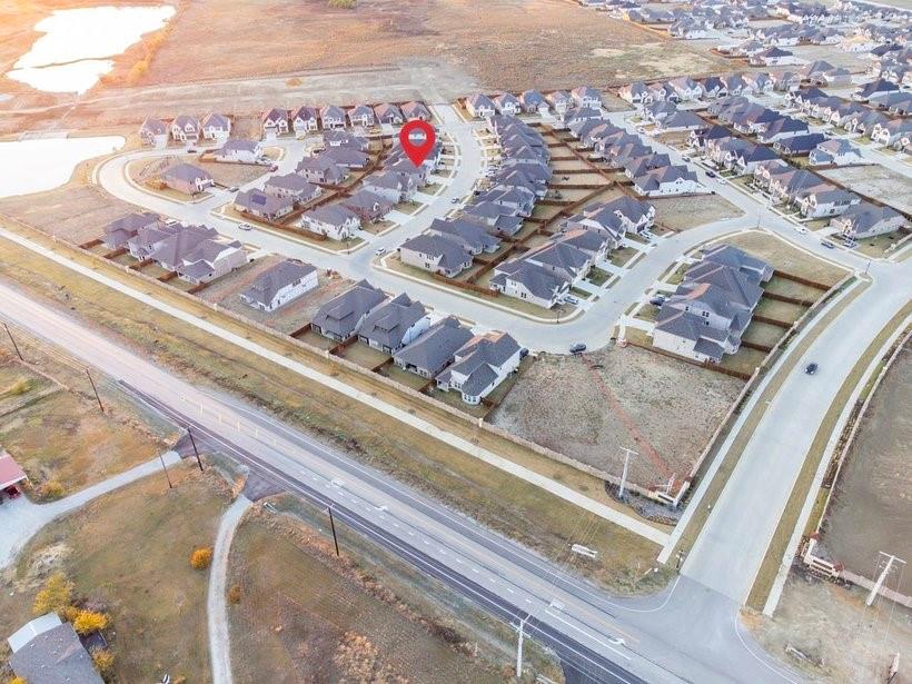 14561 Elion Court Pilot Point, TX 76258 - Photo 6 of 36 Aerial view of property and surrounding area with nearby suburban area