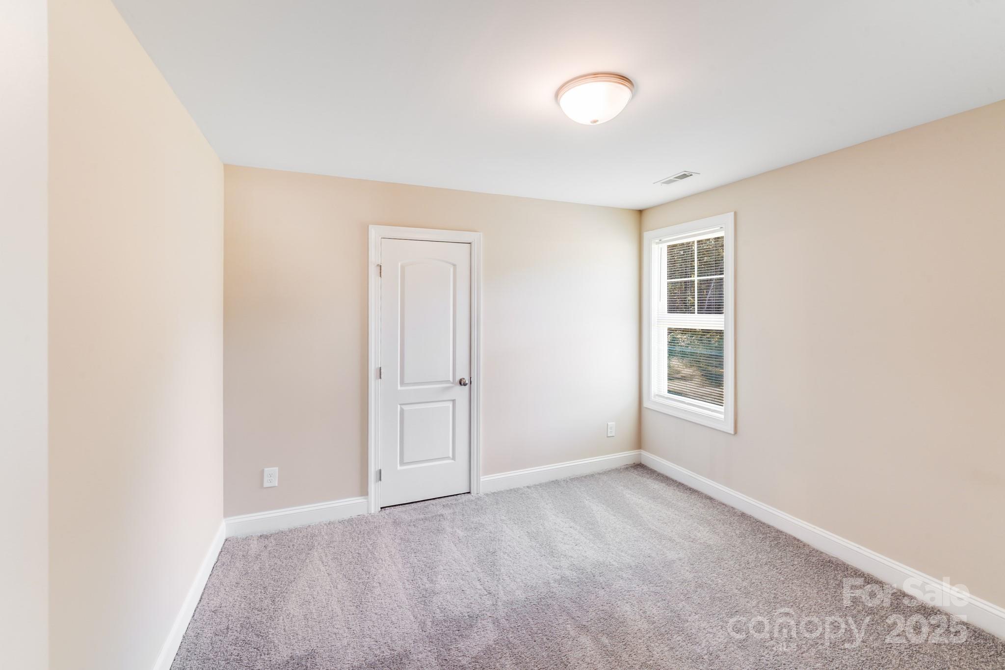 3133 Roberta Road Concord, NC 28027 - Photo 20 of 22 a view of an empty room with a window