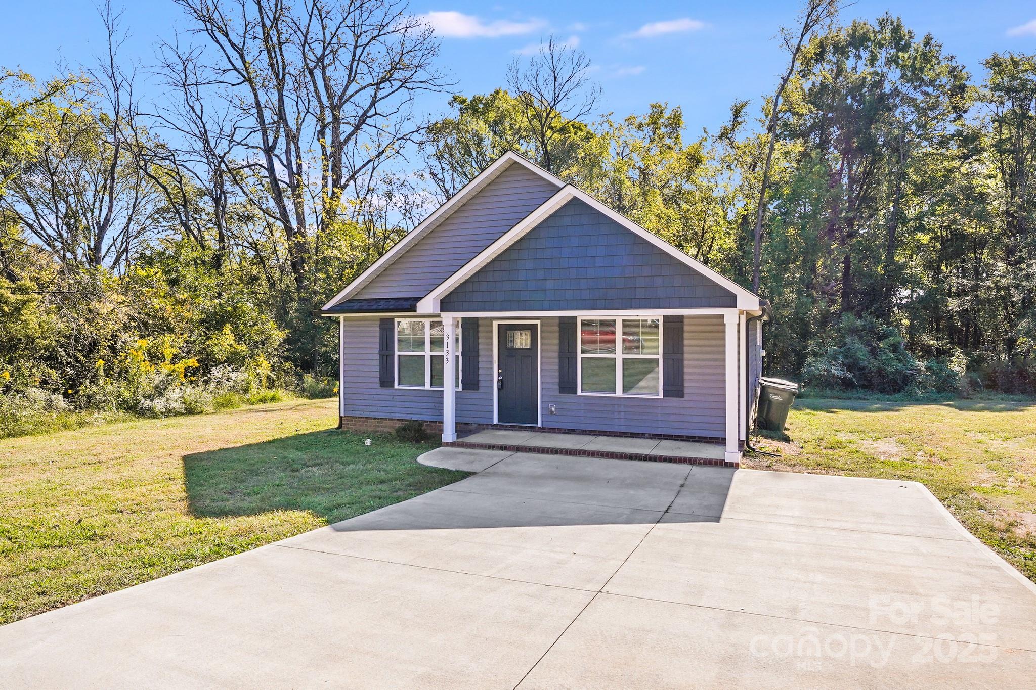 3133 Roberta Road Concord, NC 28027 - Photo 22 of 22 a front view of a house with yard