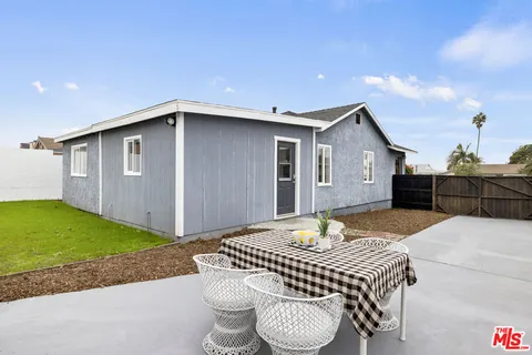 a front view of a house having yard