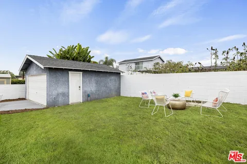 a view of a chair and table on the terrace