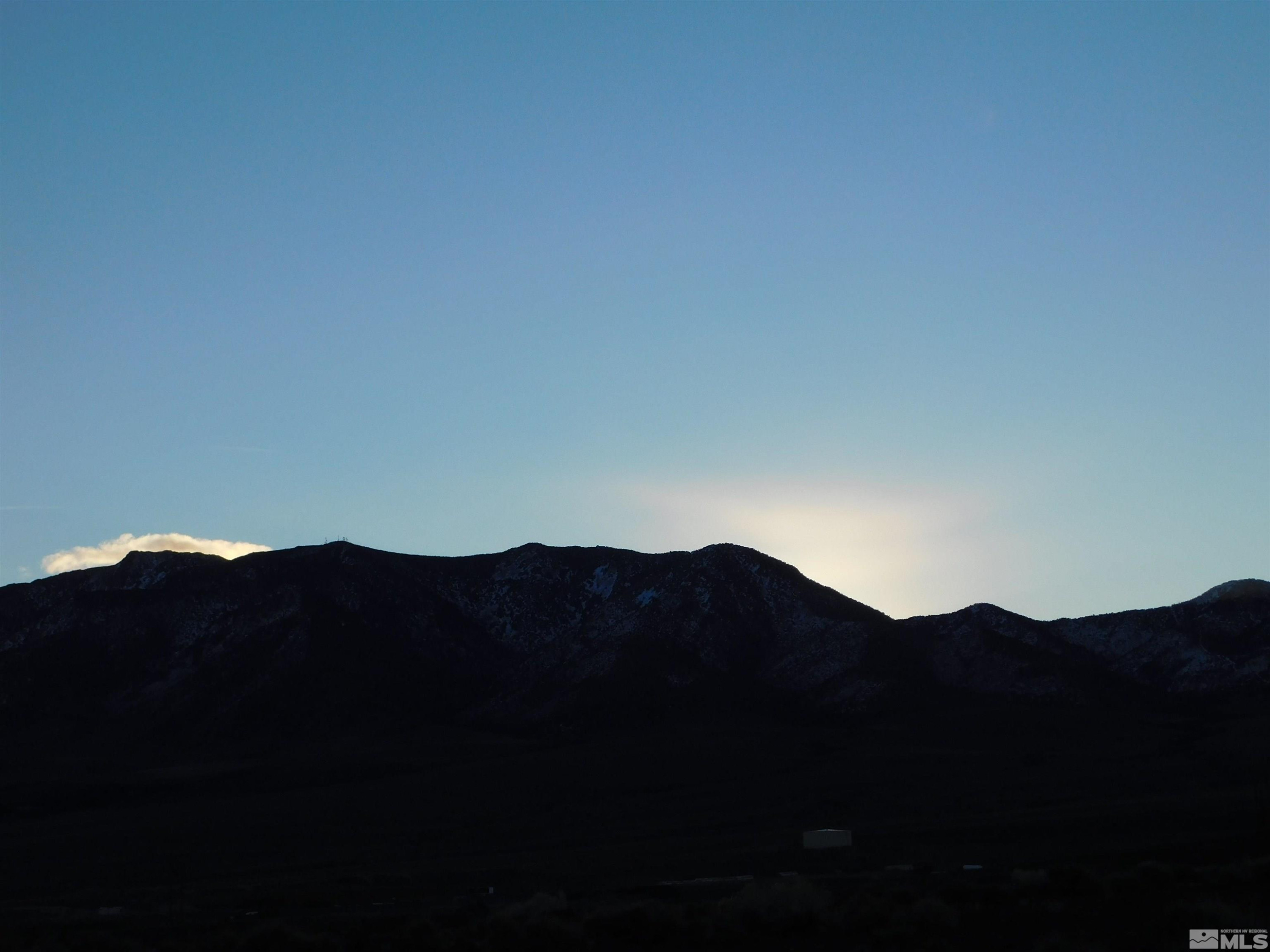 610106 Schaad Lane Dayton, NV 89403 - Photo 1 of 34 a view of a city with mountain view