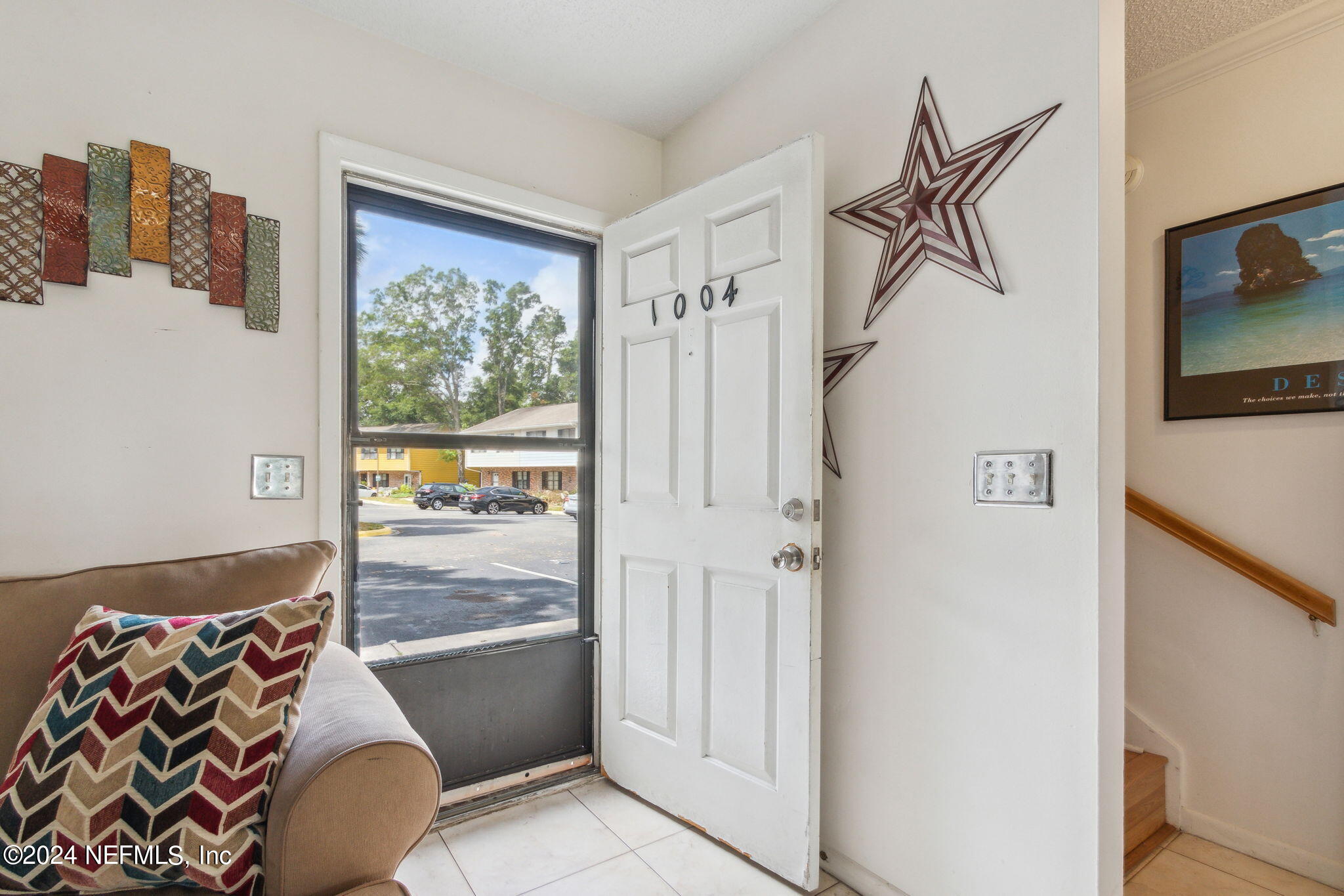 1004 Kettering Way Orange Park, FL 32073 - Photo 2 of 29 a bedroom with a bed and a couch