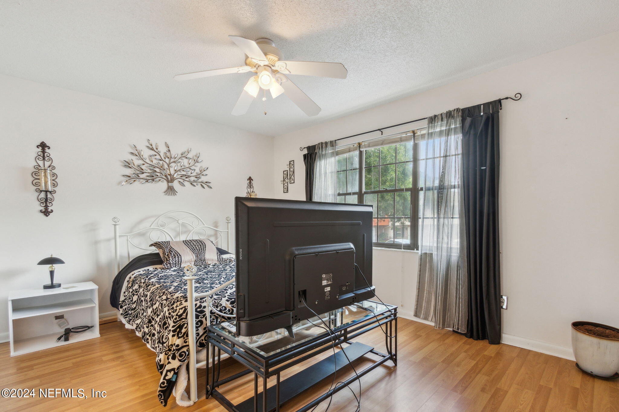 1004 Kettering Way Orange Park, FL 32073 - Photo 22 of 29 a living room with furniture and a fireplace