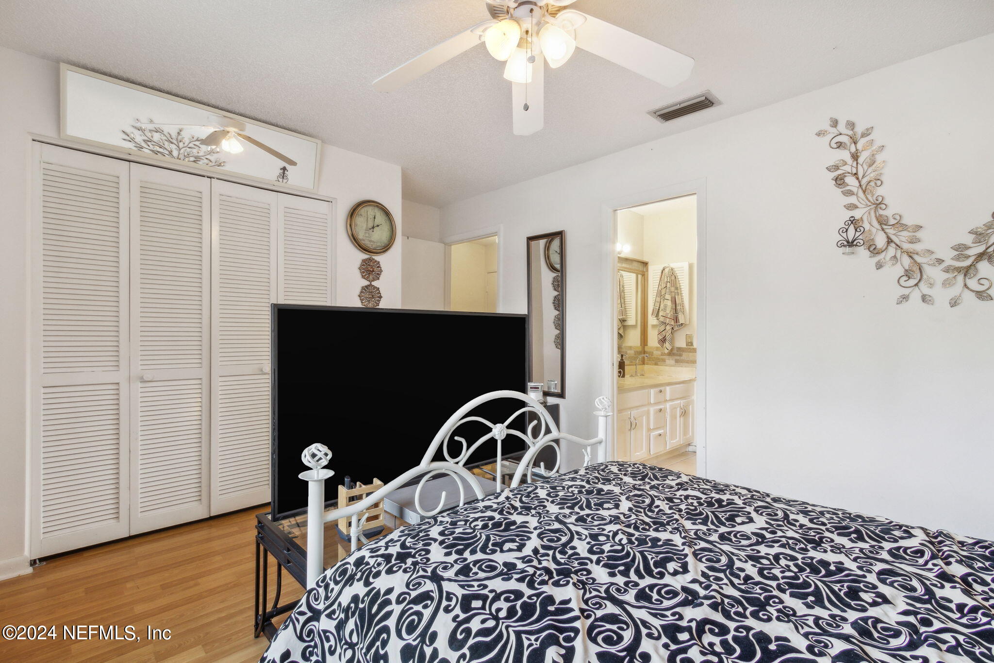 1004 Kettering Way Orange Park, FL 32073 - Photo 23 of 29 a view of a bedroom with a bed
