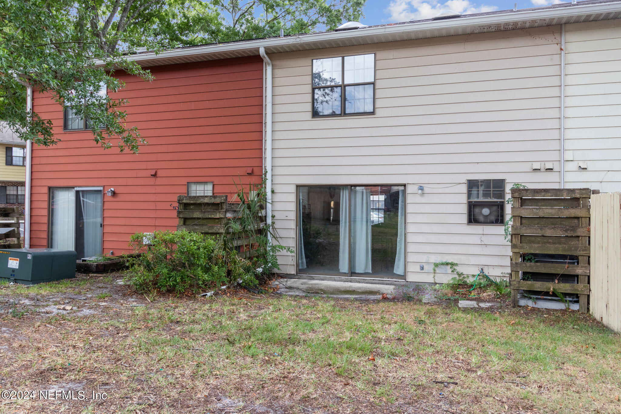 1004 Kettering Way Orange Park, FL 32073 - Photo 27 of 29 a front view of a house with a yard