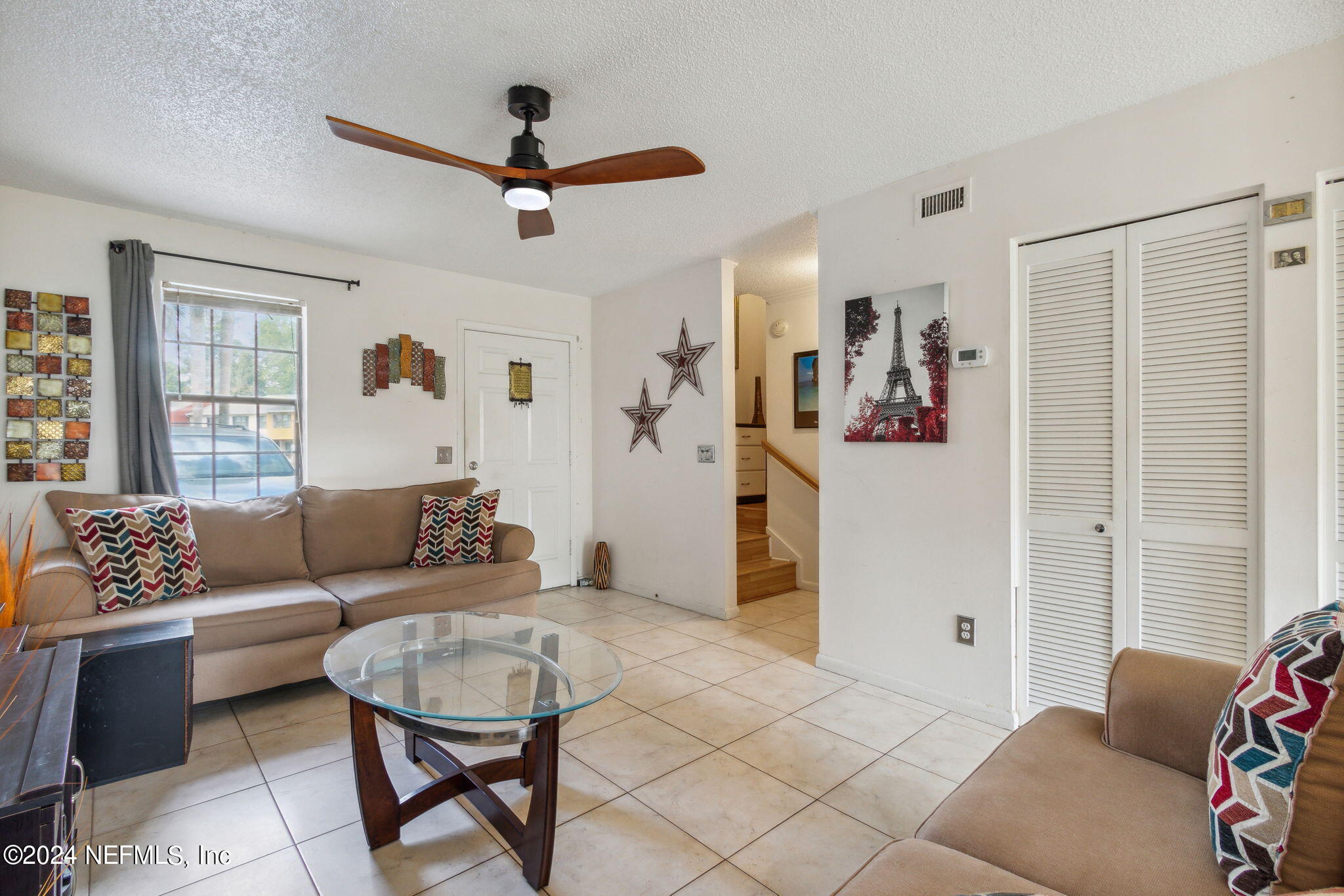 1004 Kettering Way Orange Park, FL 32073 - Photo 6 of 29 a living room with furniture and a window