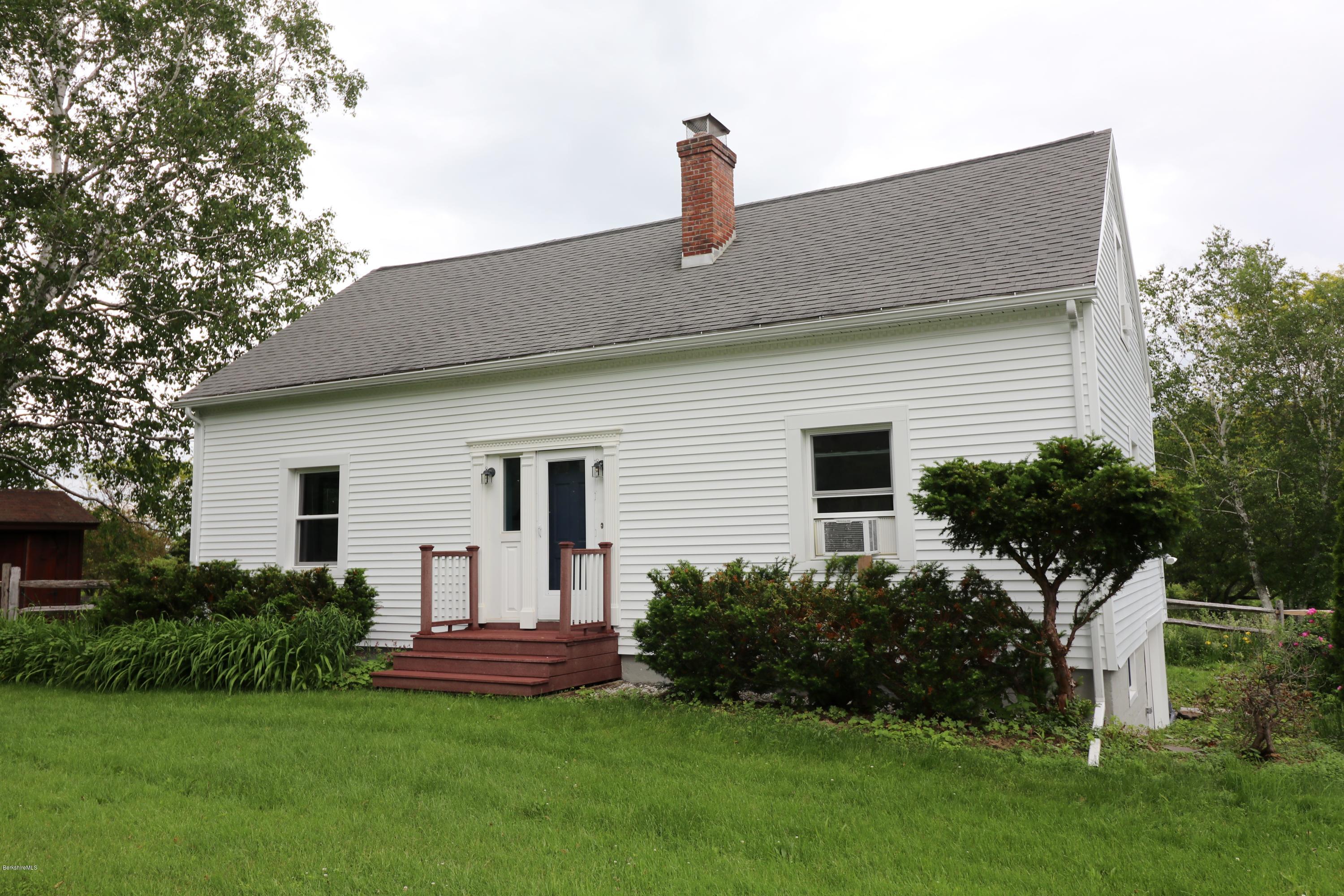 209 State Road Richmond, MA 01201 - Photo 1 of 38 a front view of house with yard and green space