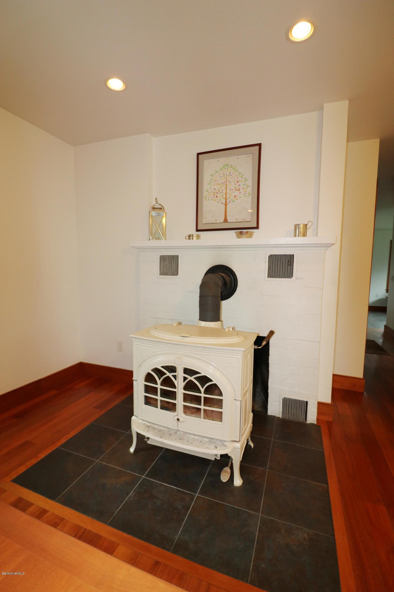 209 State Road Richmond, MA 01201 - Photo 14 of 38 a kitchen with a stove and a refrigerator