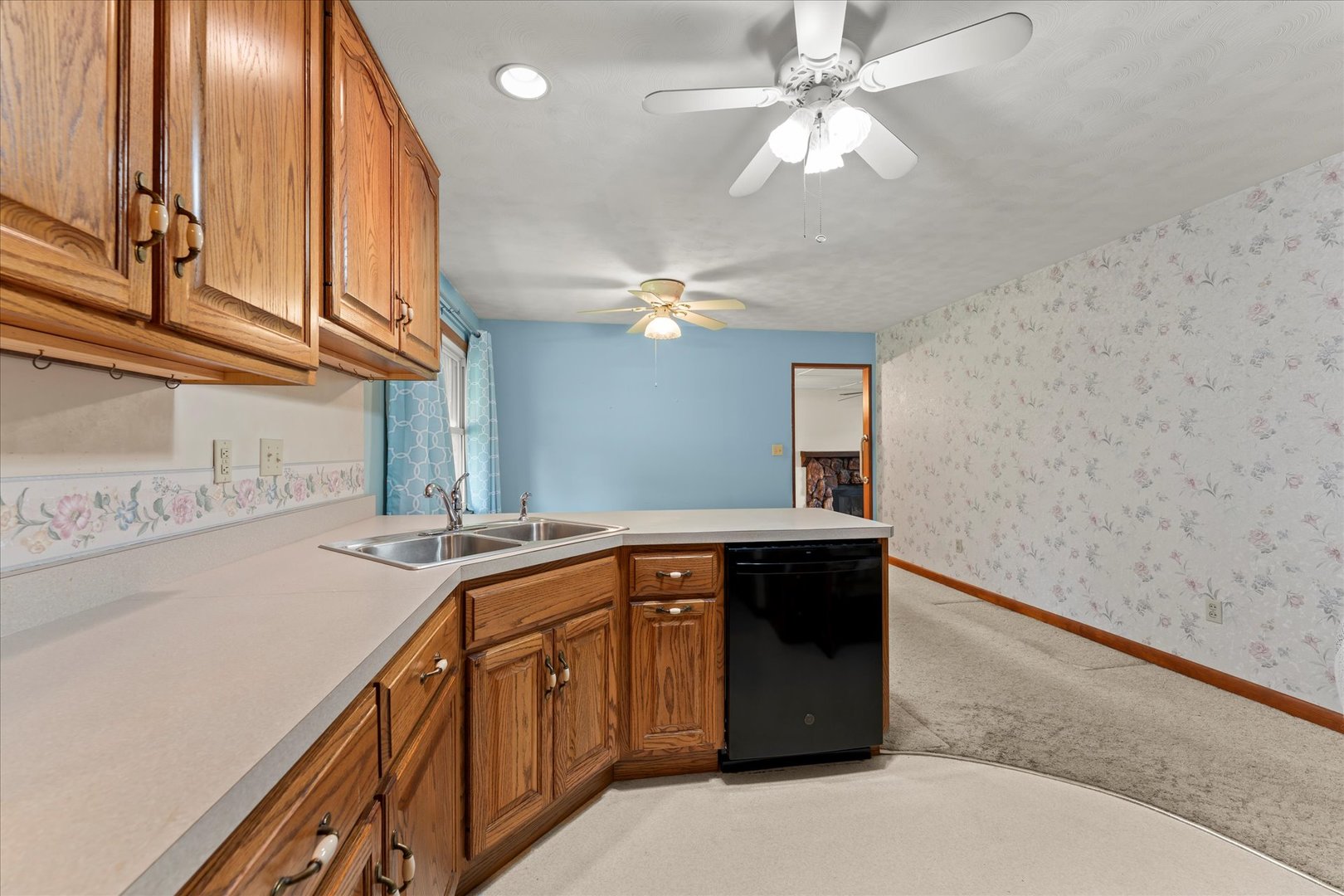 211 South Main Street Argenta, IL 62501 - Photo 13 of 32 a kitchen with a sink and chandelier