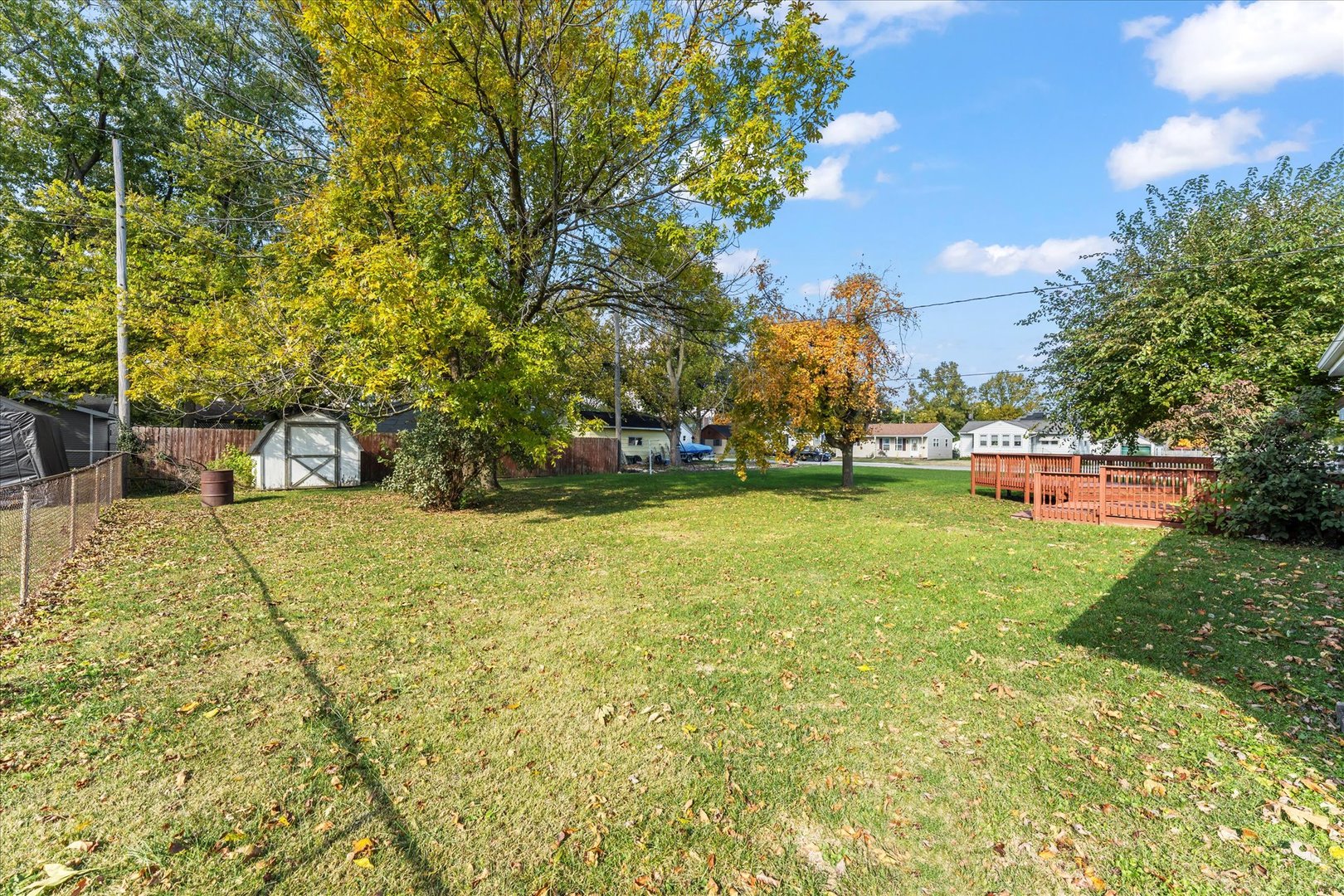 211 South Main Street Argenta, IL 62501 - Photo 31 of 32 a sign board with big yard and large trees