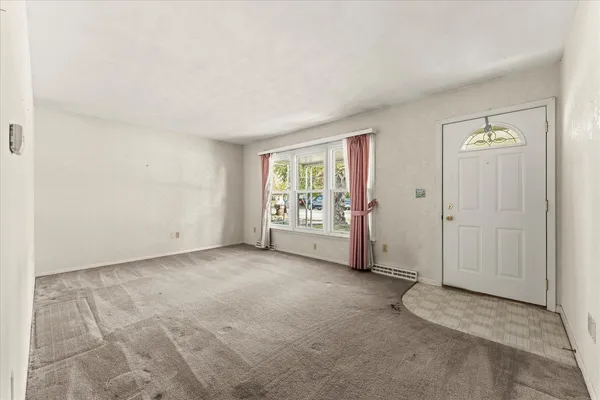 an empty room with windows
