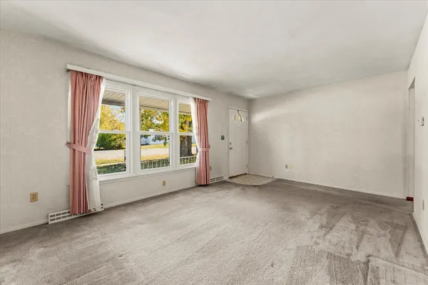 an empty room with windows