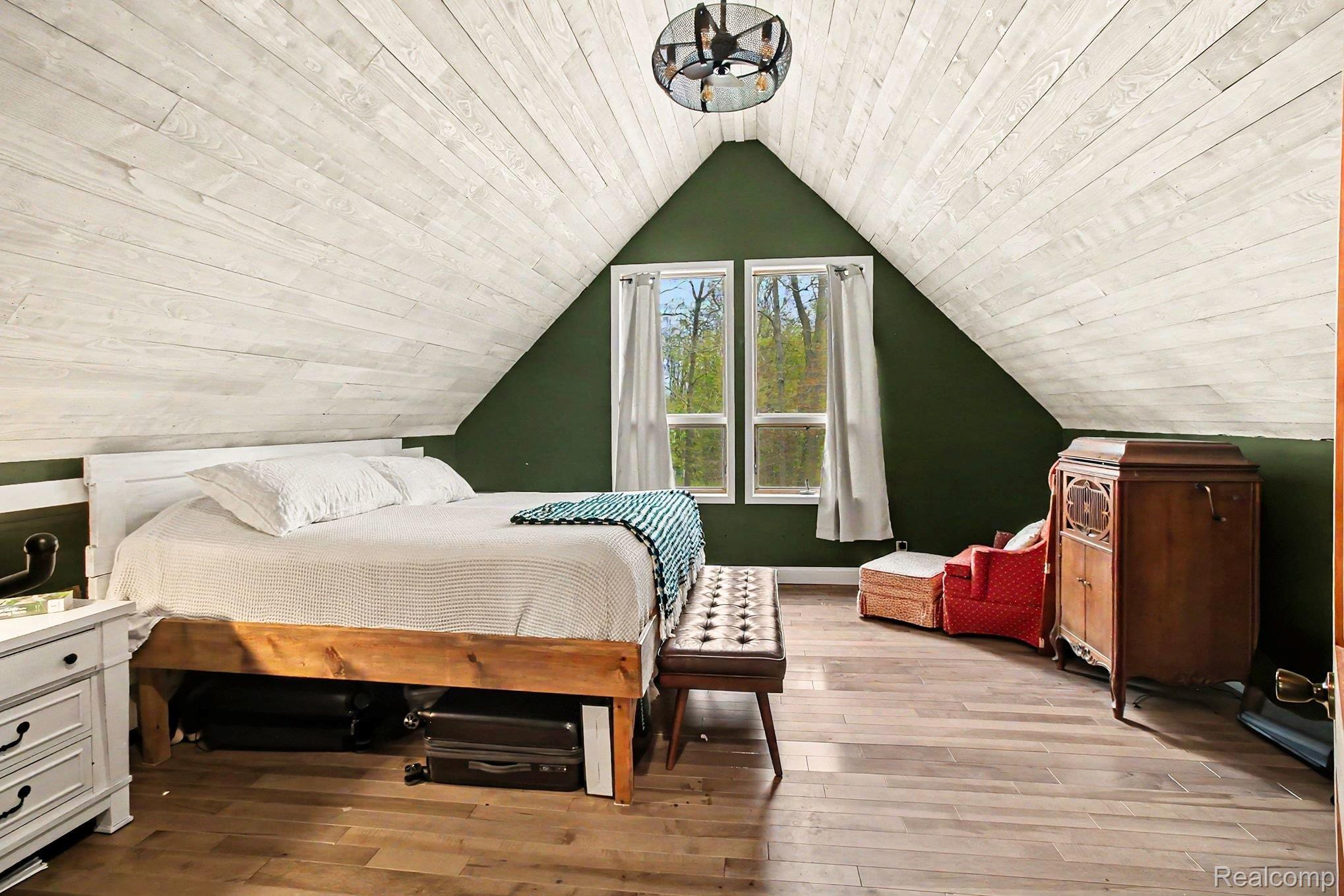 4375 Skinner Lake Road Lapeer, MI 48446 - Photo 19 of 30 Bedroom featuring light wood-style flooring and wooden ceiling