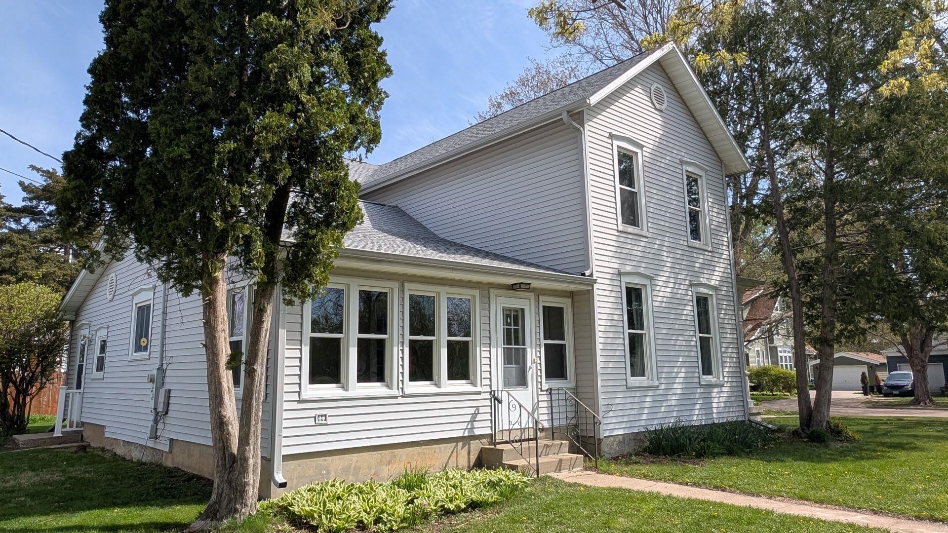 210 South 7th Street Oregon, IL 61061 - Photo 17 of 21 front view of a house with a yard