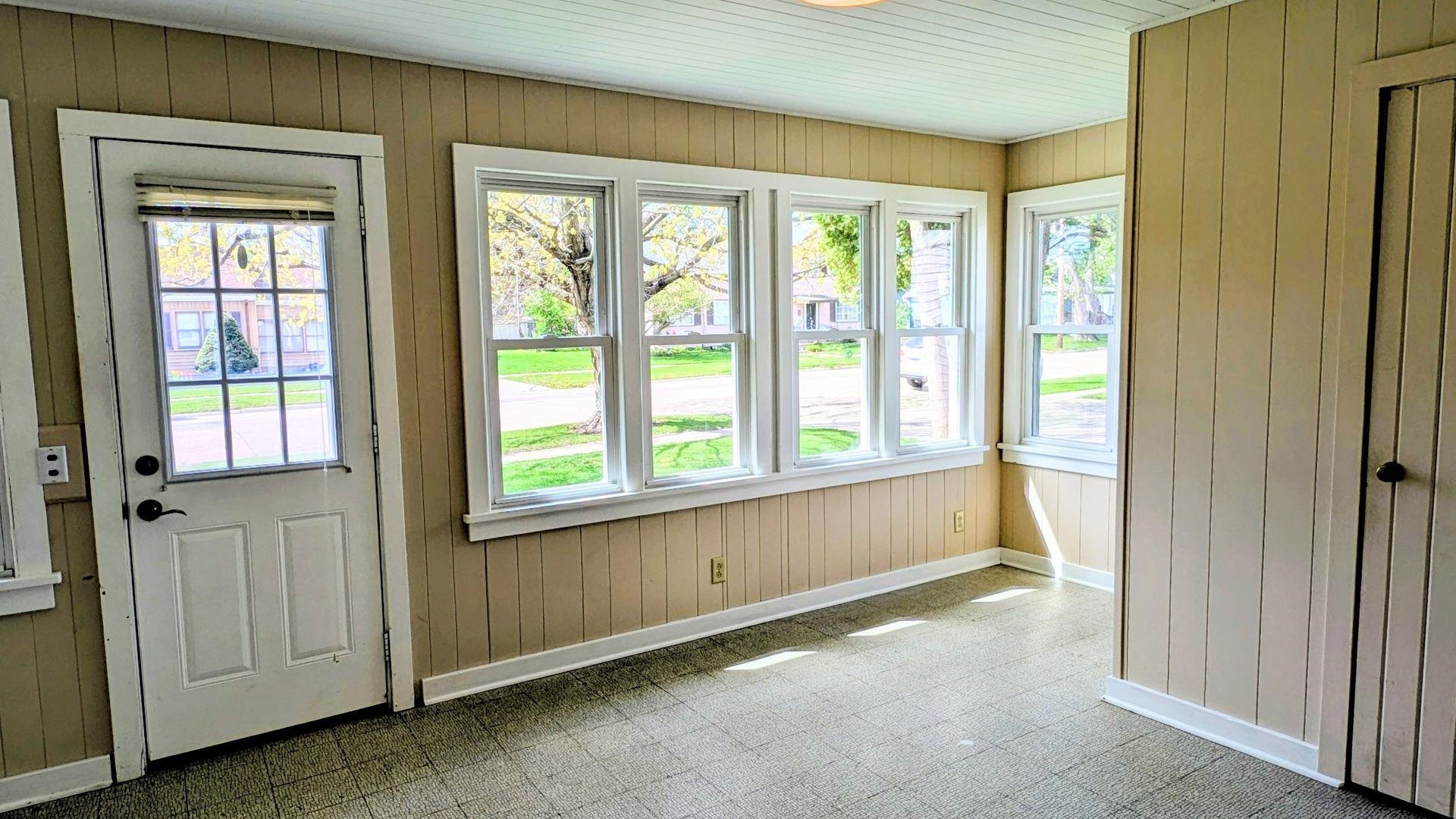 210 South 7th Street Oregon, IL 61061 - Photo 18 of 21 a view of an empty room with a window