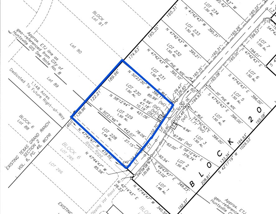 5-6-229 Dipping Vat Road Huntsville, TX 77340 - Photo 6 of 22 a picture of a book and a bed