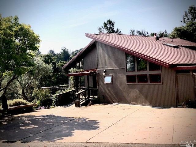 3431 Burnside Road Sebastopol, CA 95472 - Photo 1 of 1 a front view of a house with a yard