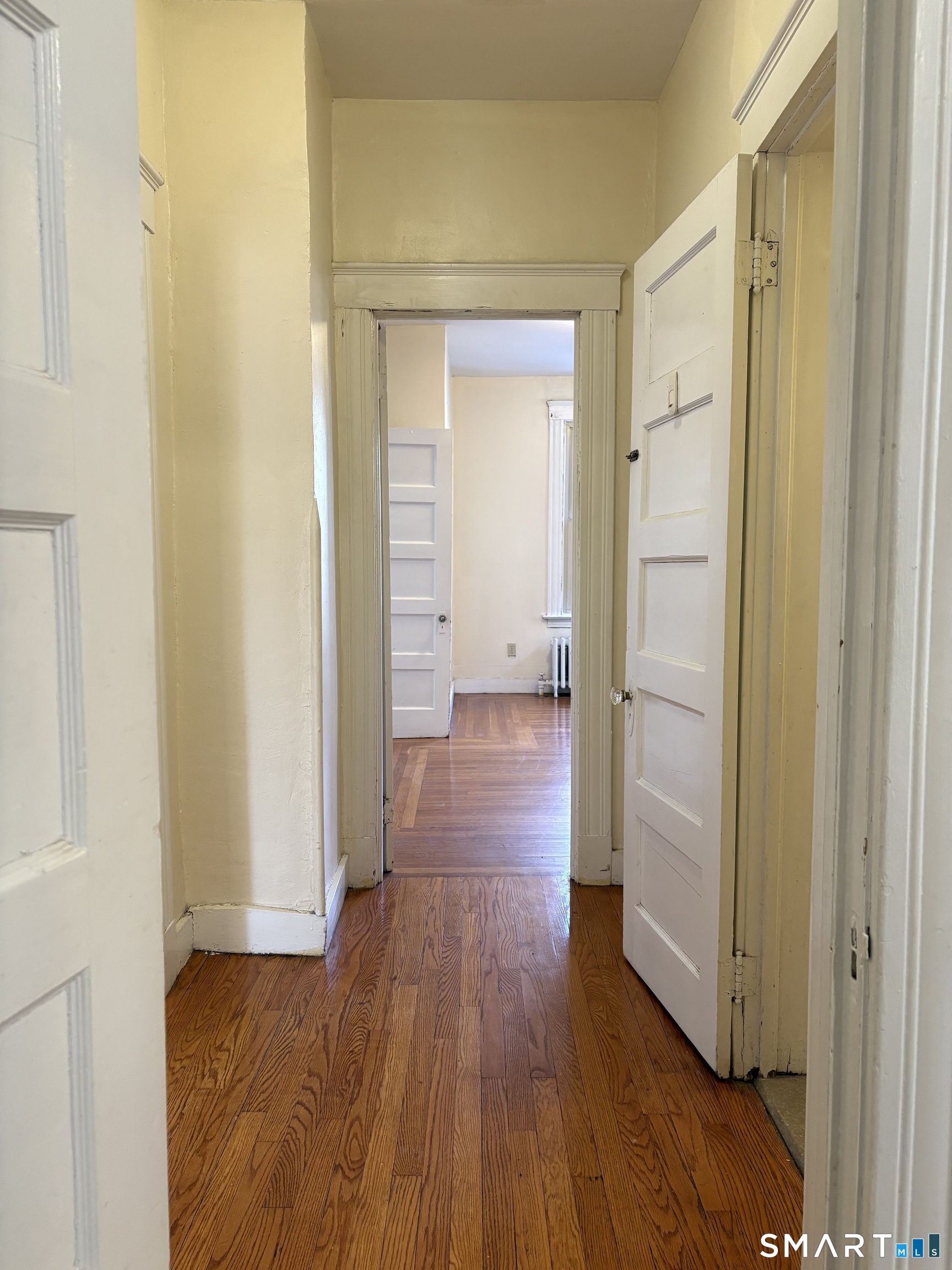 787 Elm Street, Unit 2 New Haven, CT 06511 - Photo 11 of 16 a view of a hallway with wooden floor