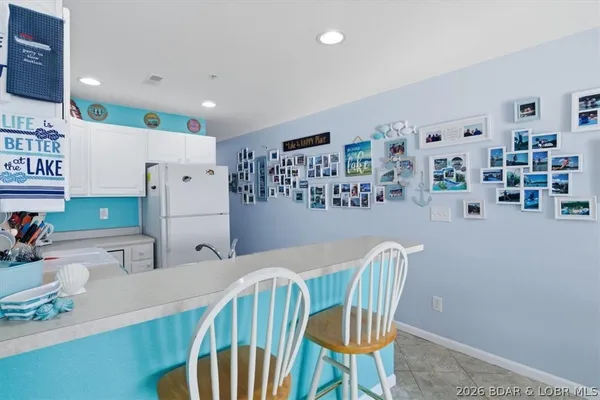 $315,000 | 128 Park Pl Lane, Unit 2B, Kaiser, MO 65047