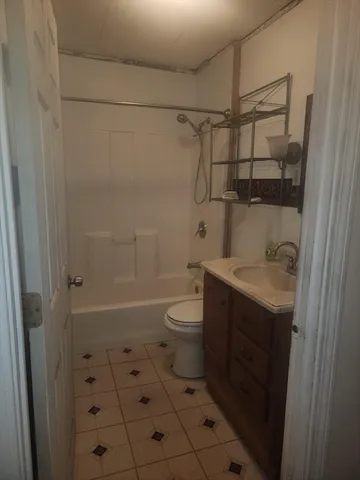 a view of a bed room with a window