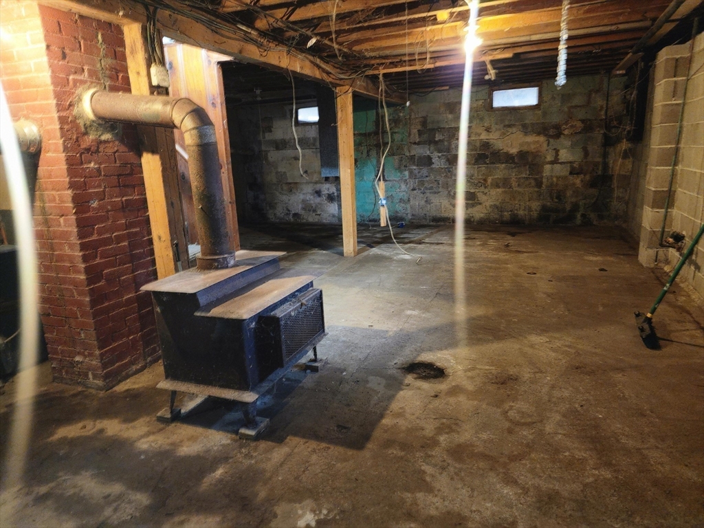 2 Alice Street Montague, MA 01376 - Photo 15 of 18 a backyard of a house with barbeque oven table and chairs