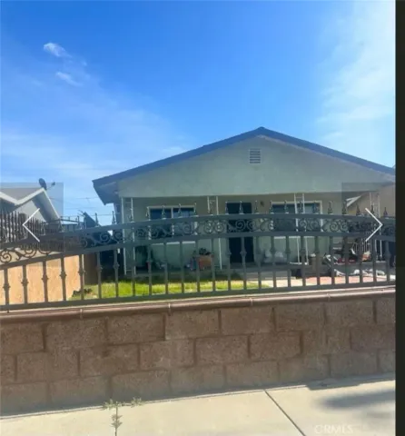 a view of a swimming pool with an outdoor seating