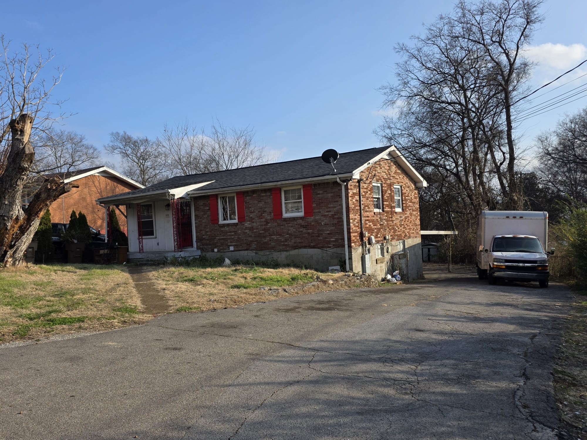353 Elysian Fields Road, Unit A Nashville, TN 37211 - Photo 2 of 16 a view of a house with a yard
