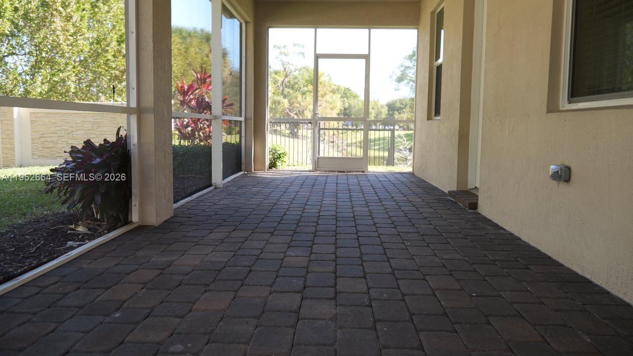 3917 Mahogany Lane Hollywood, FL 33021 - Photo 14 of 16 a view of empty room with windows