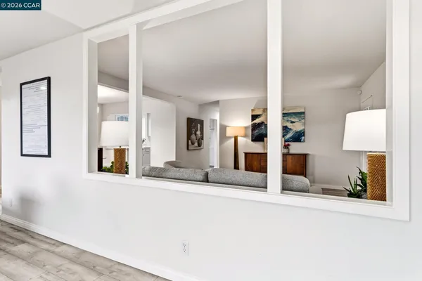 a bedroom with a bed and a table