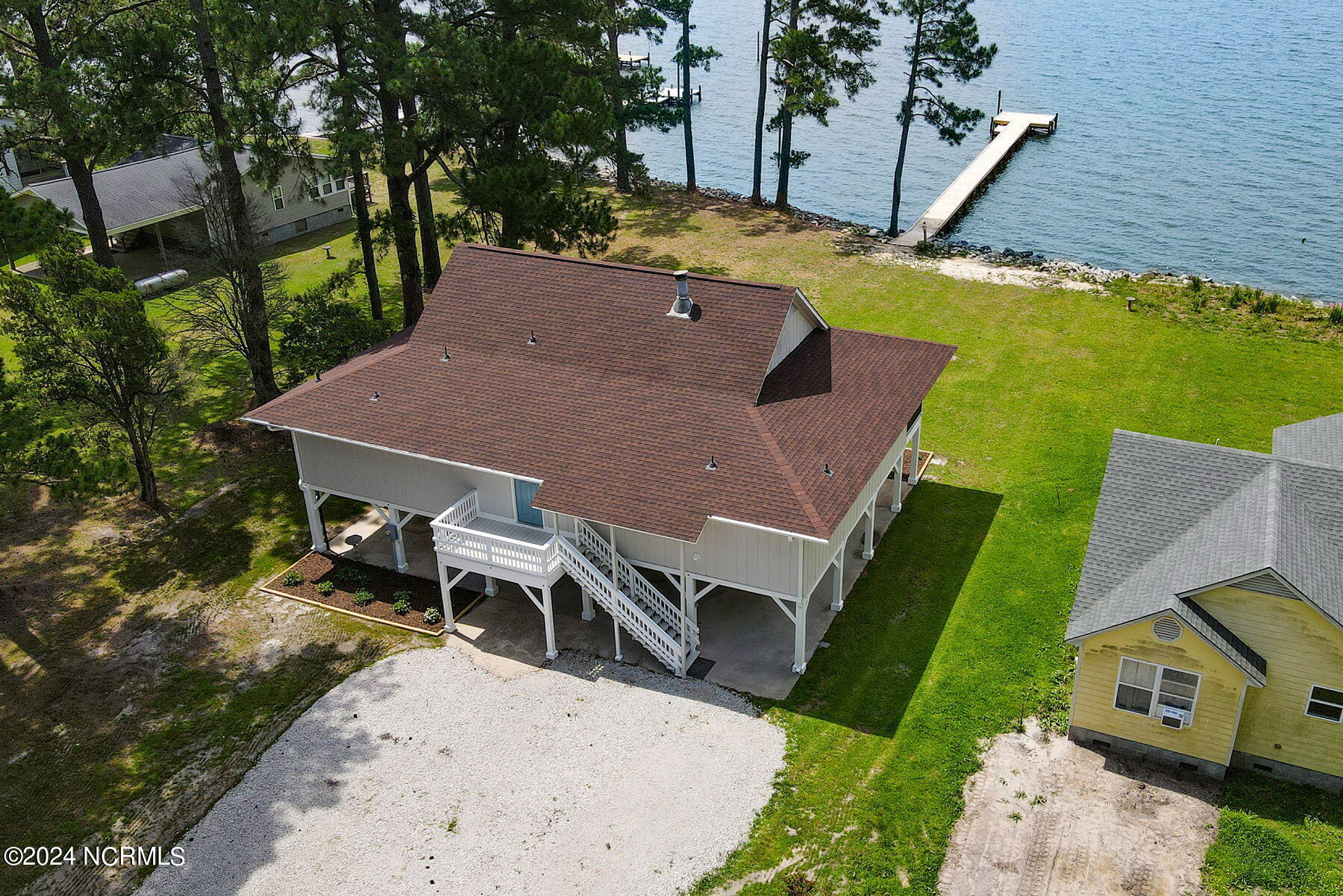 2017 Old Pamlico Beach Road West Belhaven, NC 27810 - Photo 2 of 26 Drone view shows how large the lot is. 100 feet wide waterfront and 100 ft. road front.