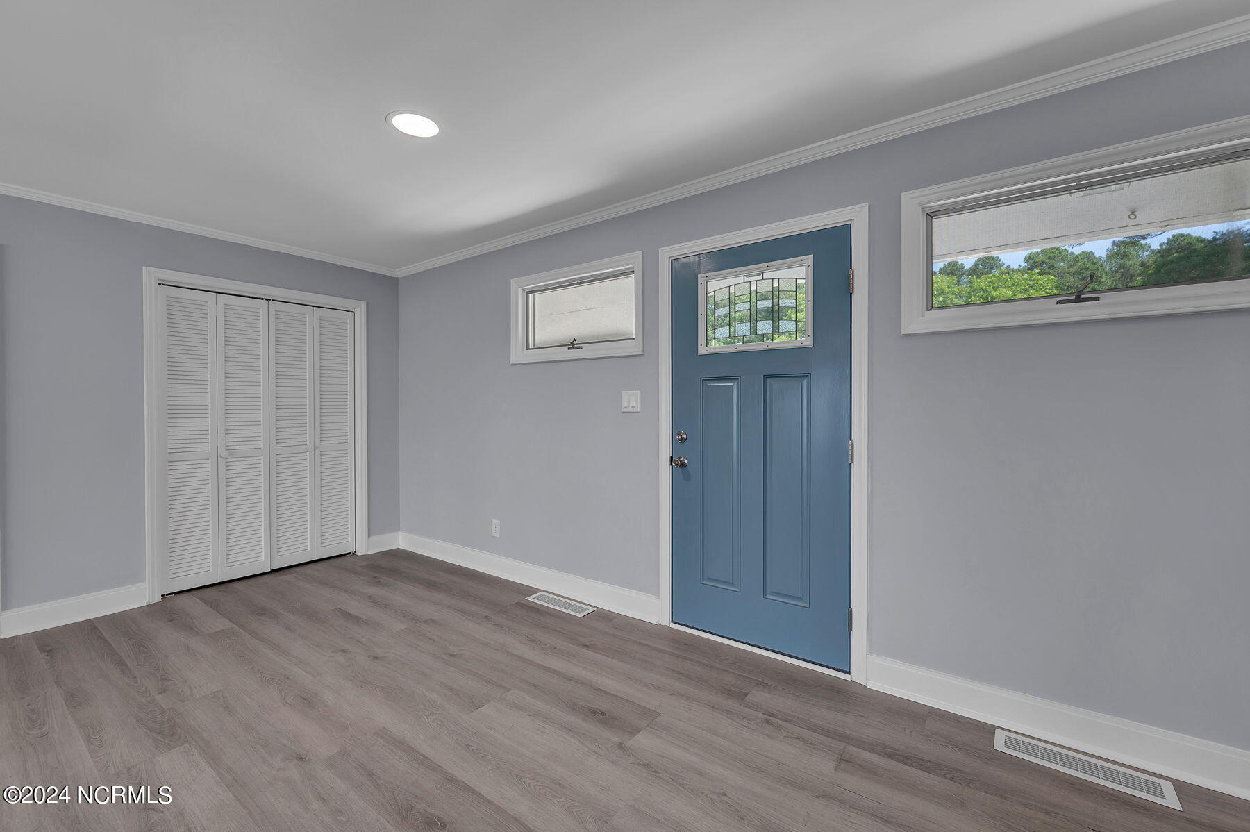 2017 Old Pamlico Beach Road West Belhaven, NC 27810 - Photo 4 of 26 Coat closet just inside the front door.