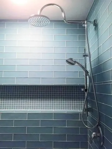 a bedroom with a large bed and a dresser