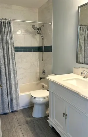 a view of a lake with a building in the background