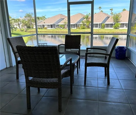 a view of a porch with a wooden floor