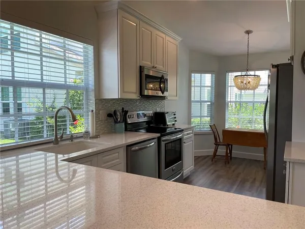 a room with furniture and a chandelier