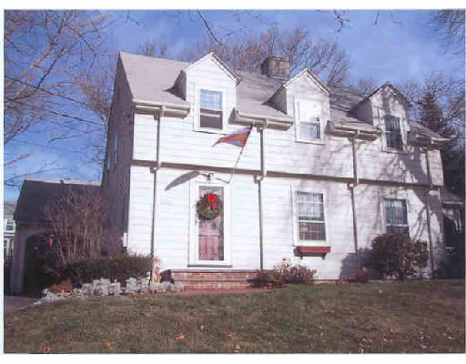 320 Florence Road Waltham, MA 02453 - Photo 1 of 1 front view of house with a yard