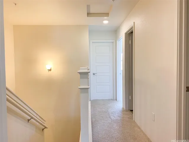 a view of hallway with shower