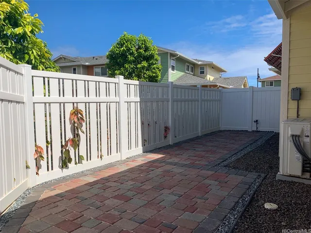 a view of a backyard of the house